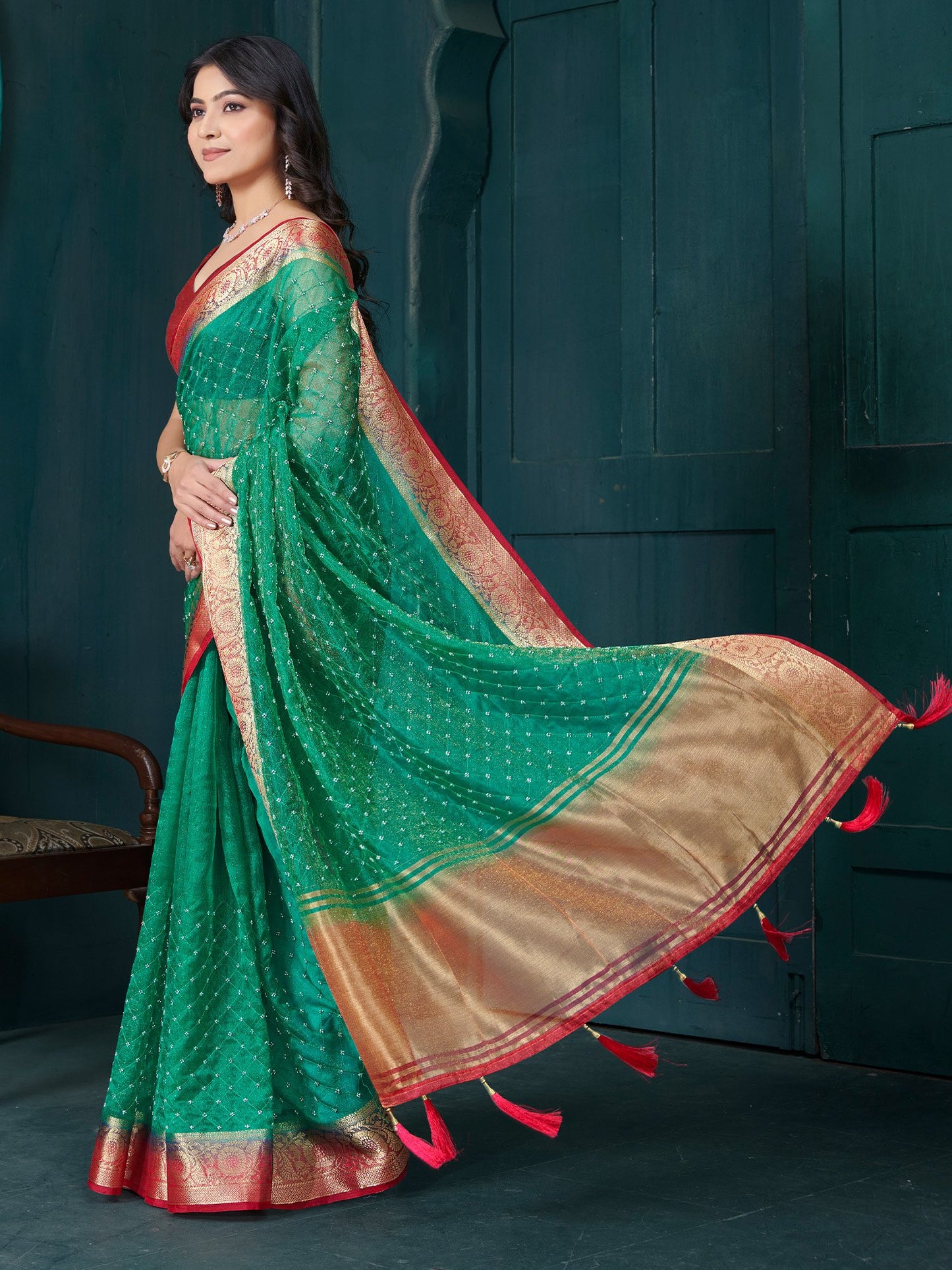 Green Party Wear Tissue Woven Saree