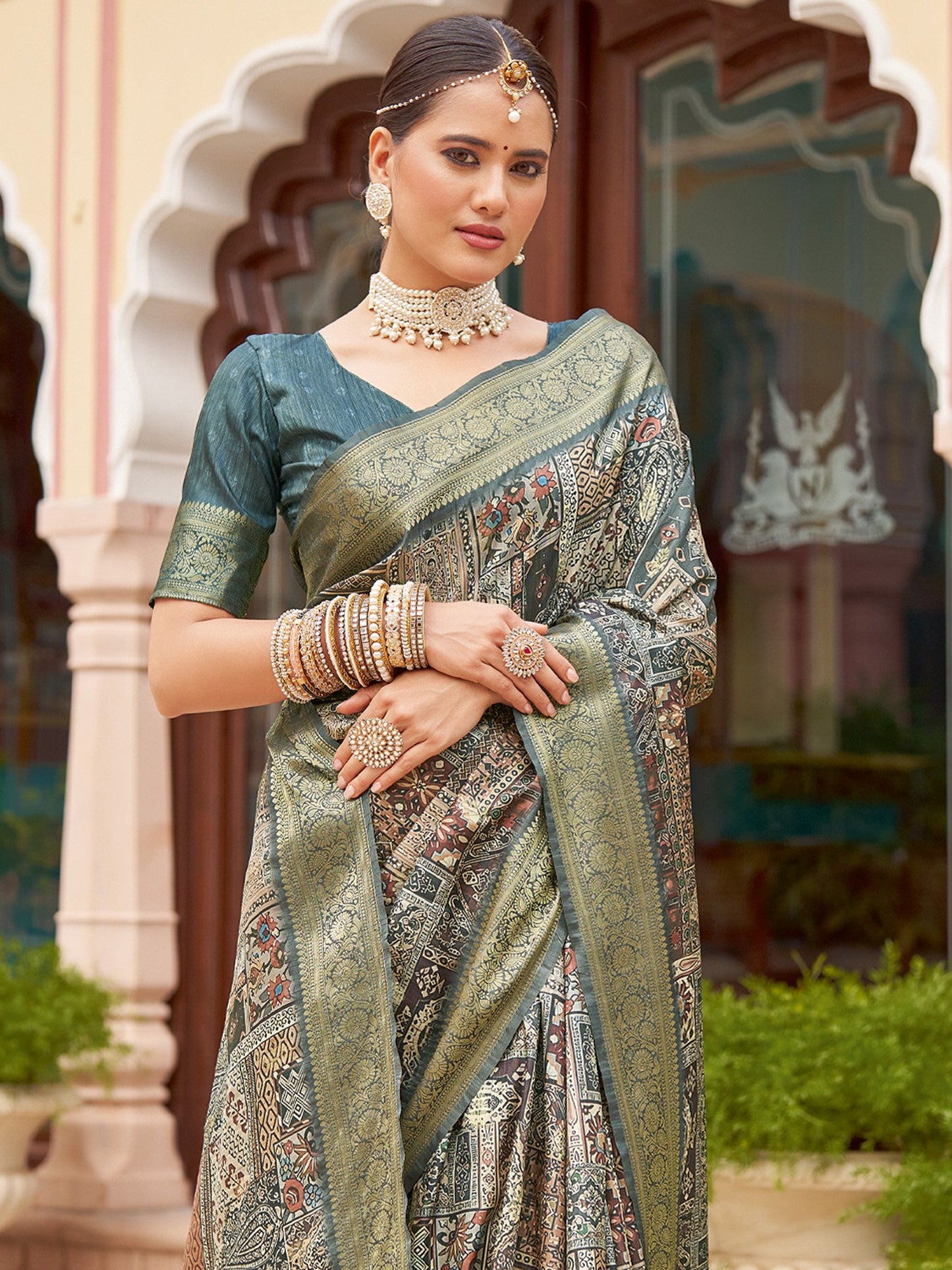Teal Sungudi Silk Blend Woven Saree