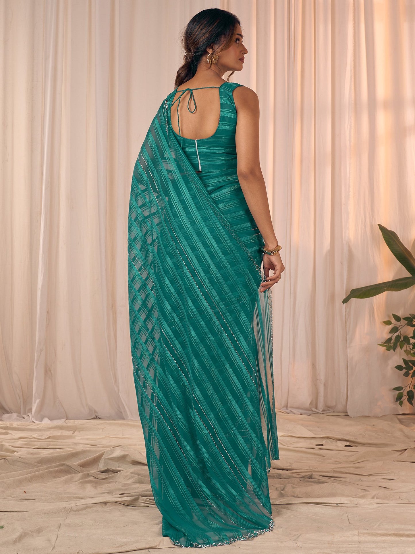 Teal Party Wear Georgette Embellished Saree