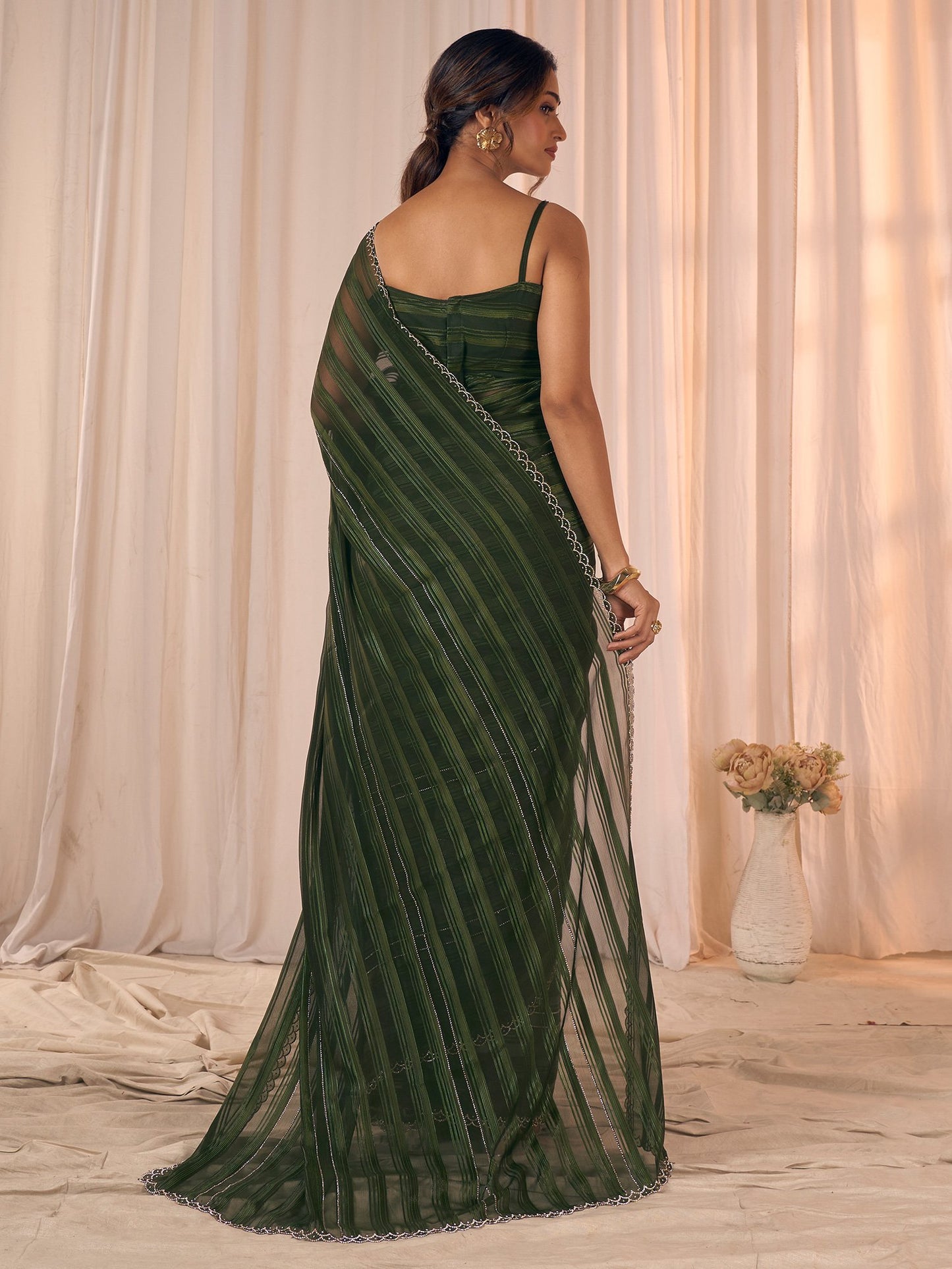 Dark Party Wear Georgette Embellished Saree