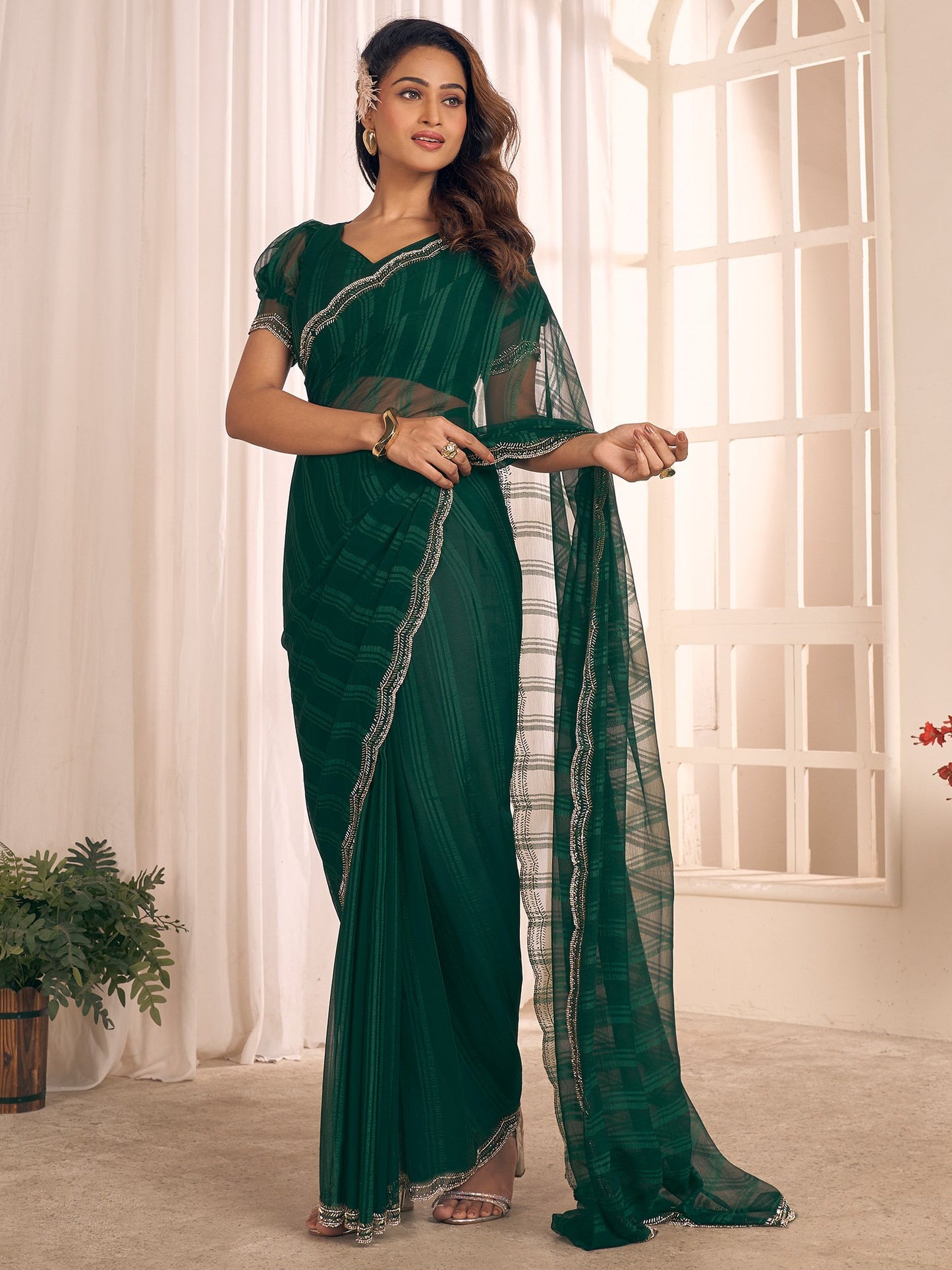Dark Party Wear Georgette Embellished Saree