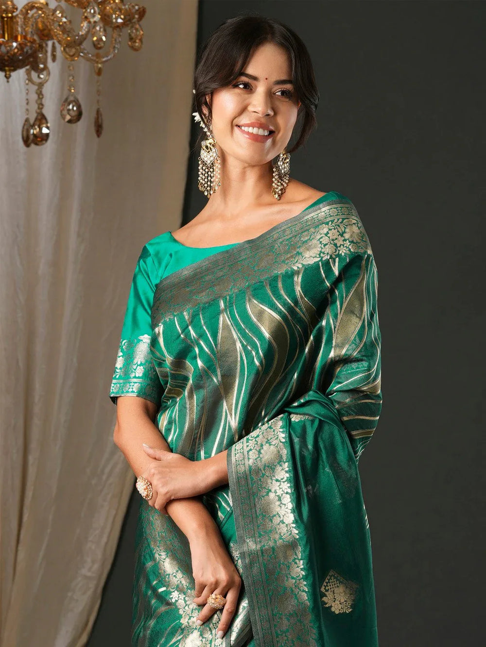 Exquisite Teal green Georgette Saree - The Dori Store
