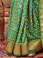 Regal Light Green Patola Silk Saree - The Dori Store