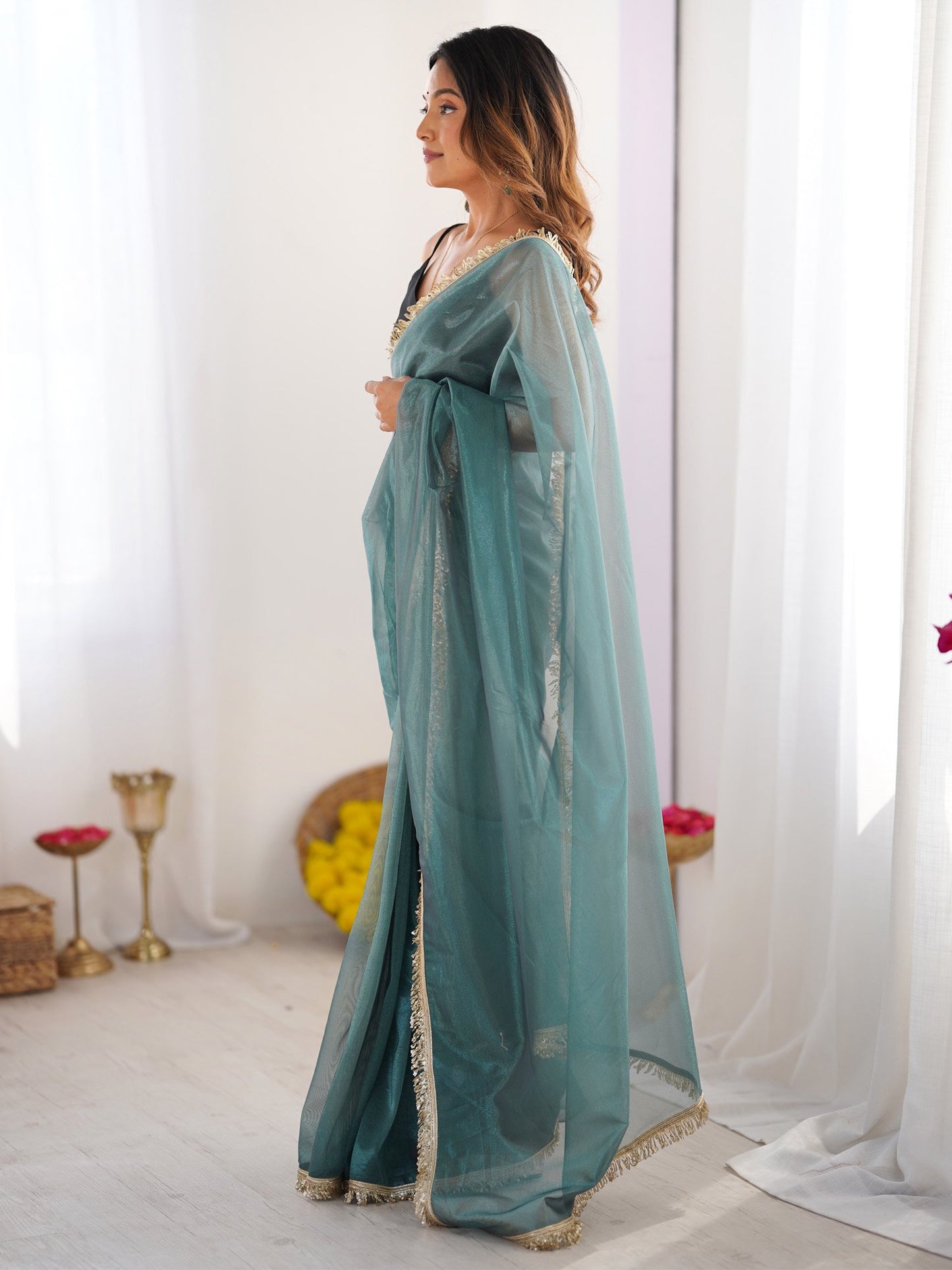 Teal Party Wear Net Embellished Saree