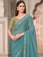 Turquoise Party Wear Pure Georgette Embellished Saree