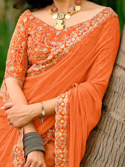 Orange Leheriya Georgette Embroidered Saree