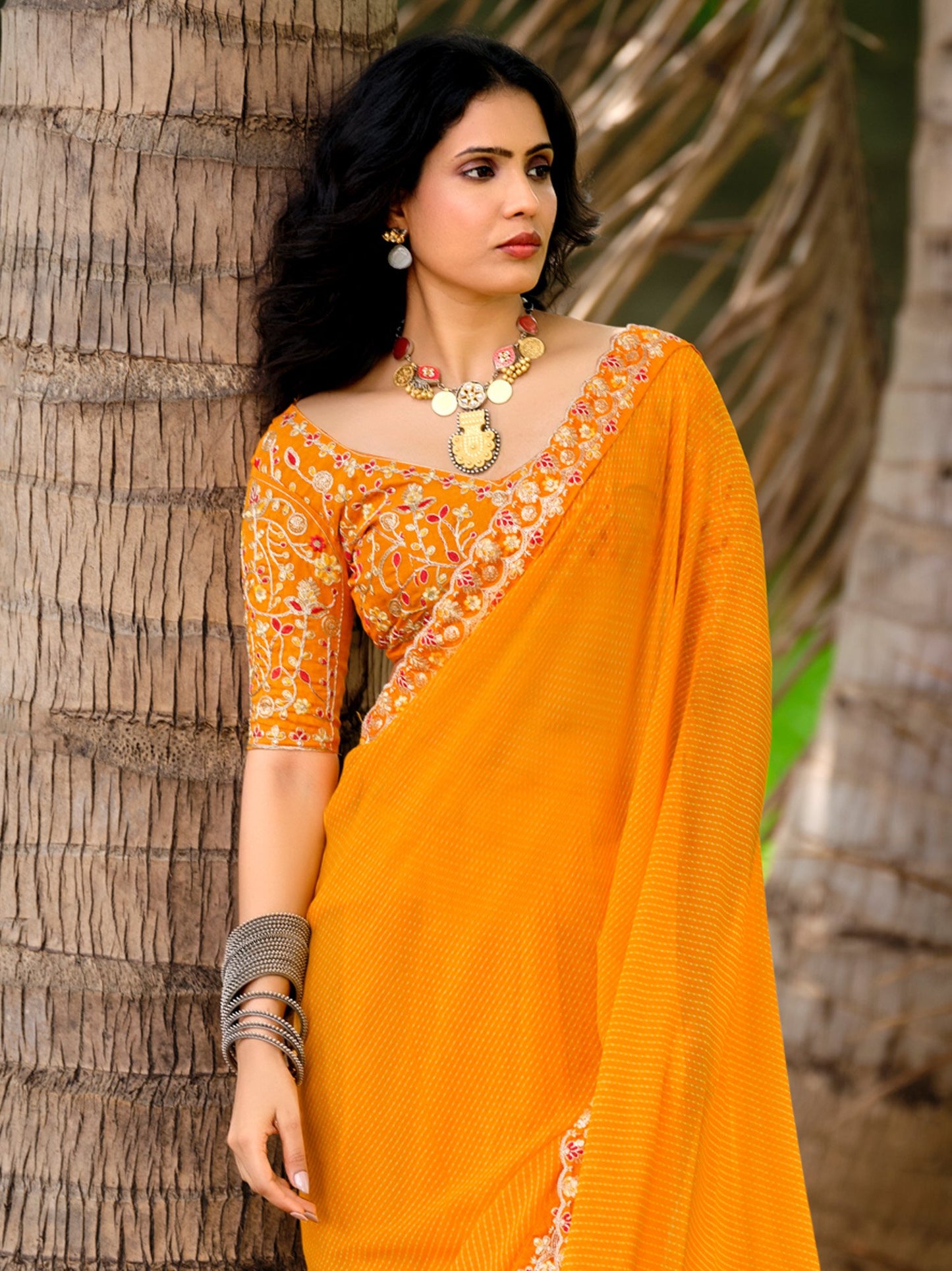 Yellow Leheriya Georgette Embroidered Saree