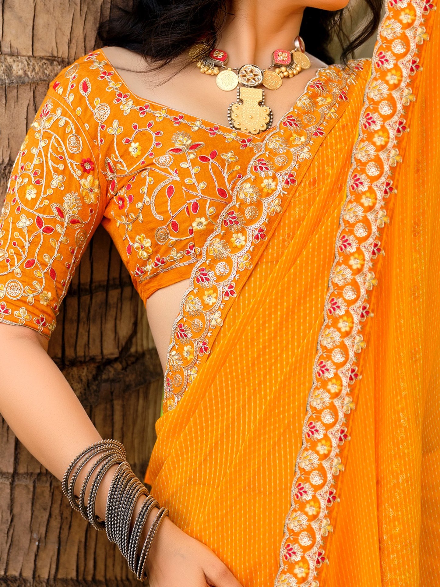 Yellow Leheriya Georgette Embroidered Saree
