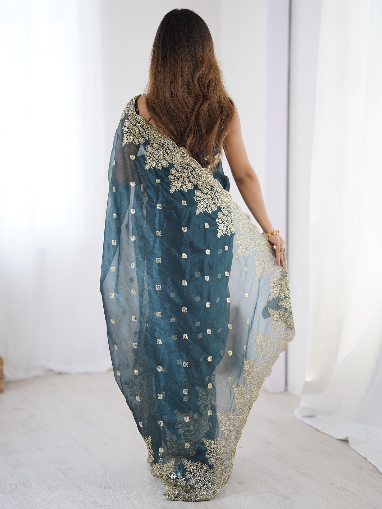 Teal Party Wear Net Embellished Saree