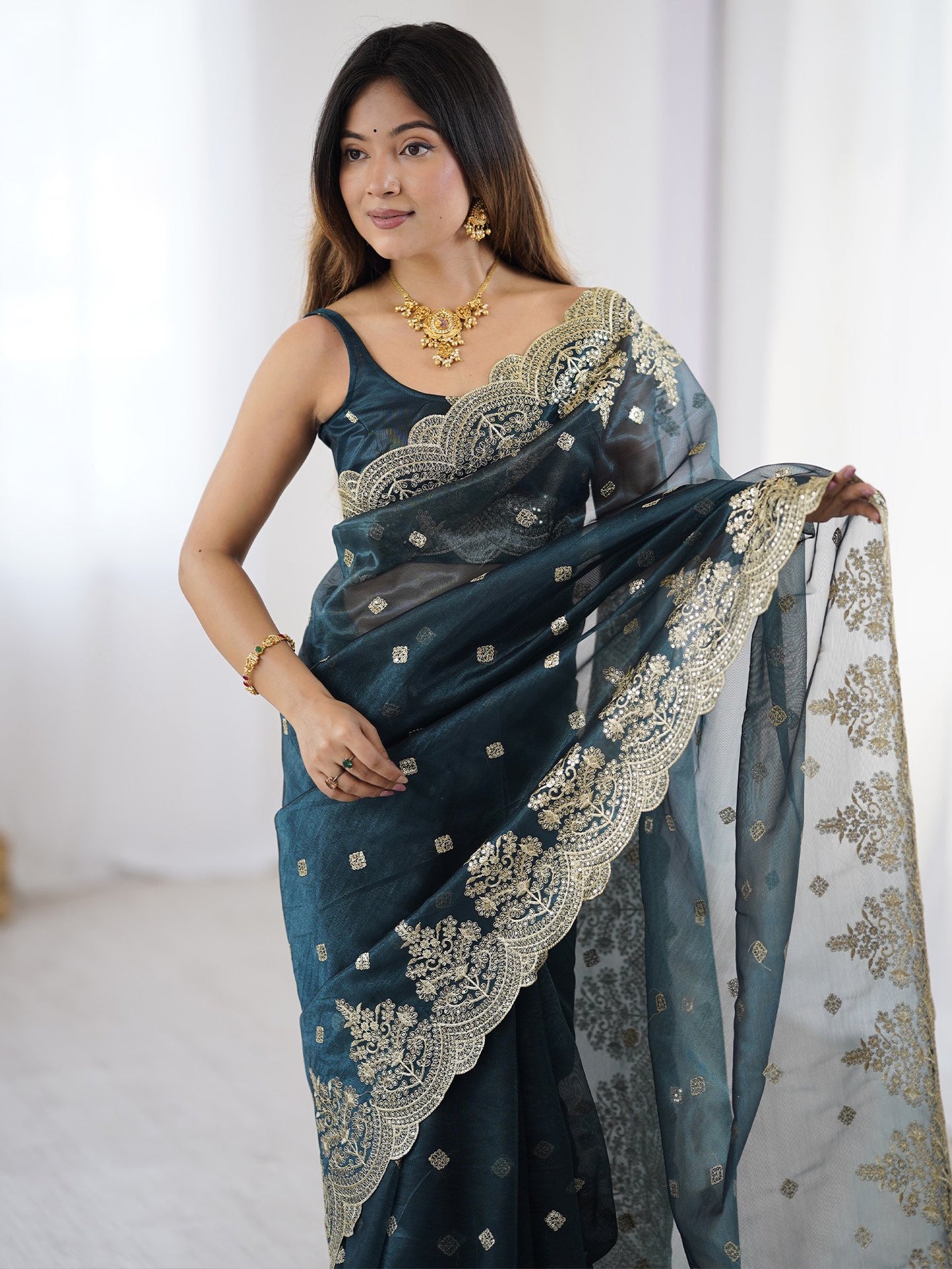 Teal Party Wear Net Embellished Saree