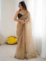 Beige Party Wear Net Embellished Saree
