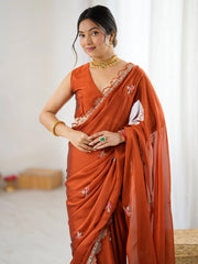 Rust Party Wear Georgette Embellished Saree