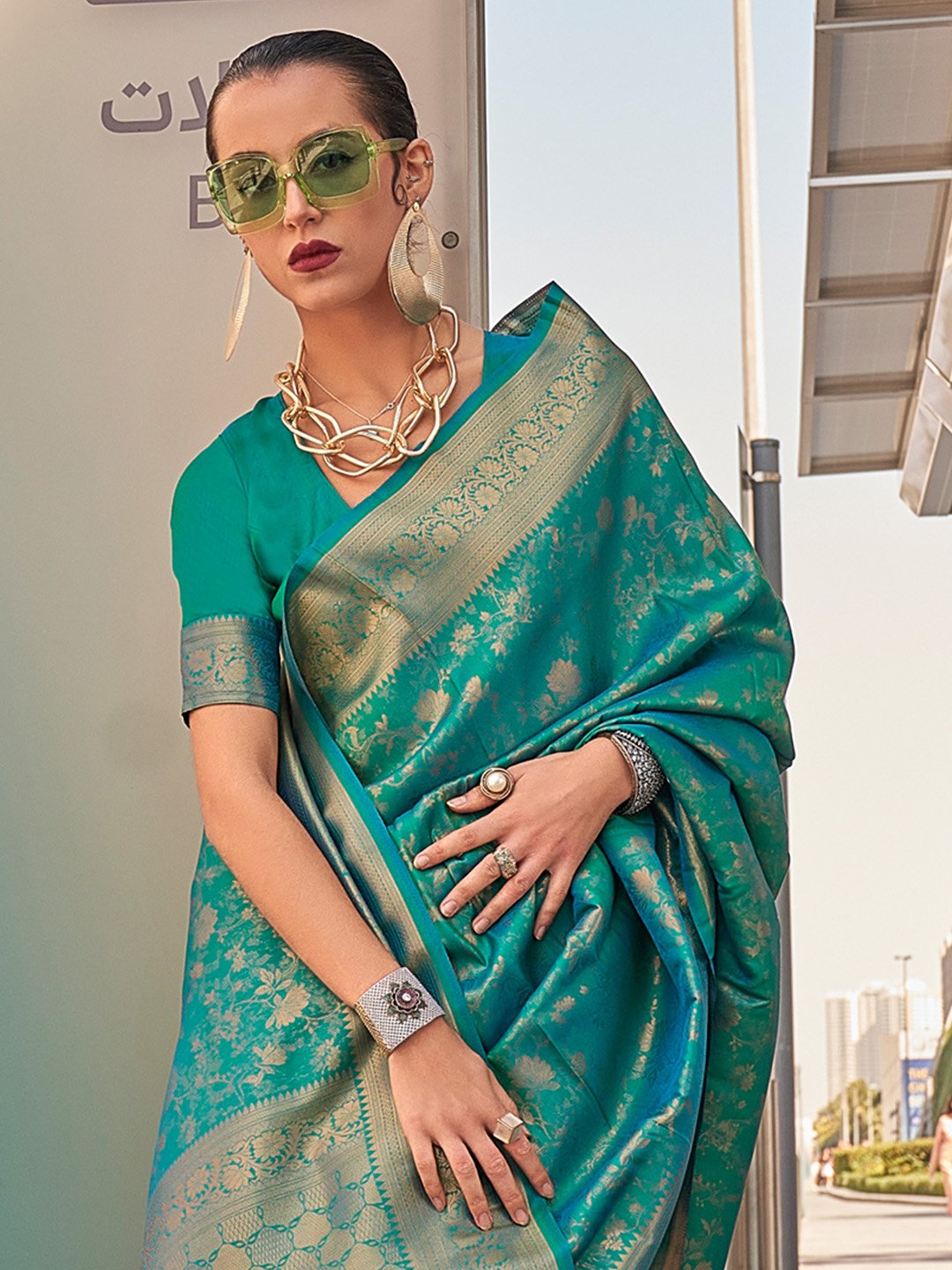 Teal Kanjeevaram Silk Woven Saree