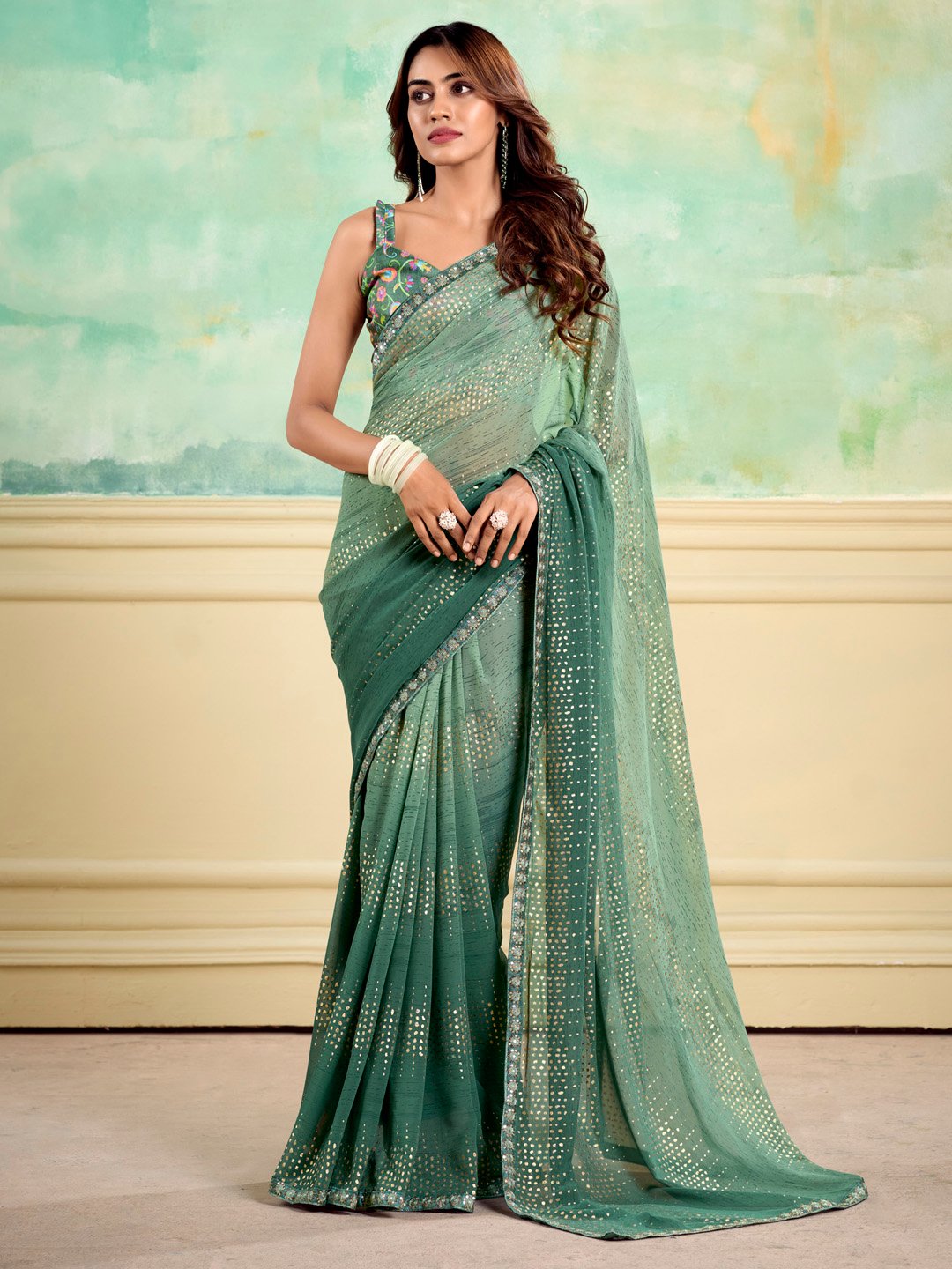 Teal green Flowing Georgette Foil Saree