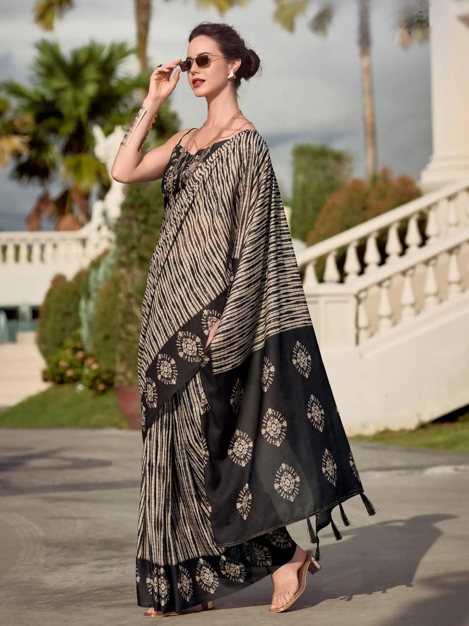 Creamish Black Printed Mal Mal Silk Saree