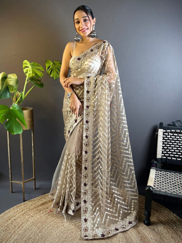 Opulent Beige Designer Zari Woven Variant Saree - Net Saree