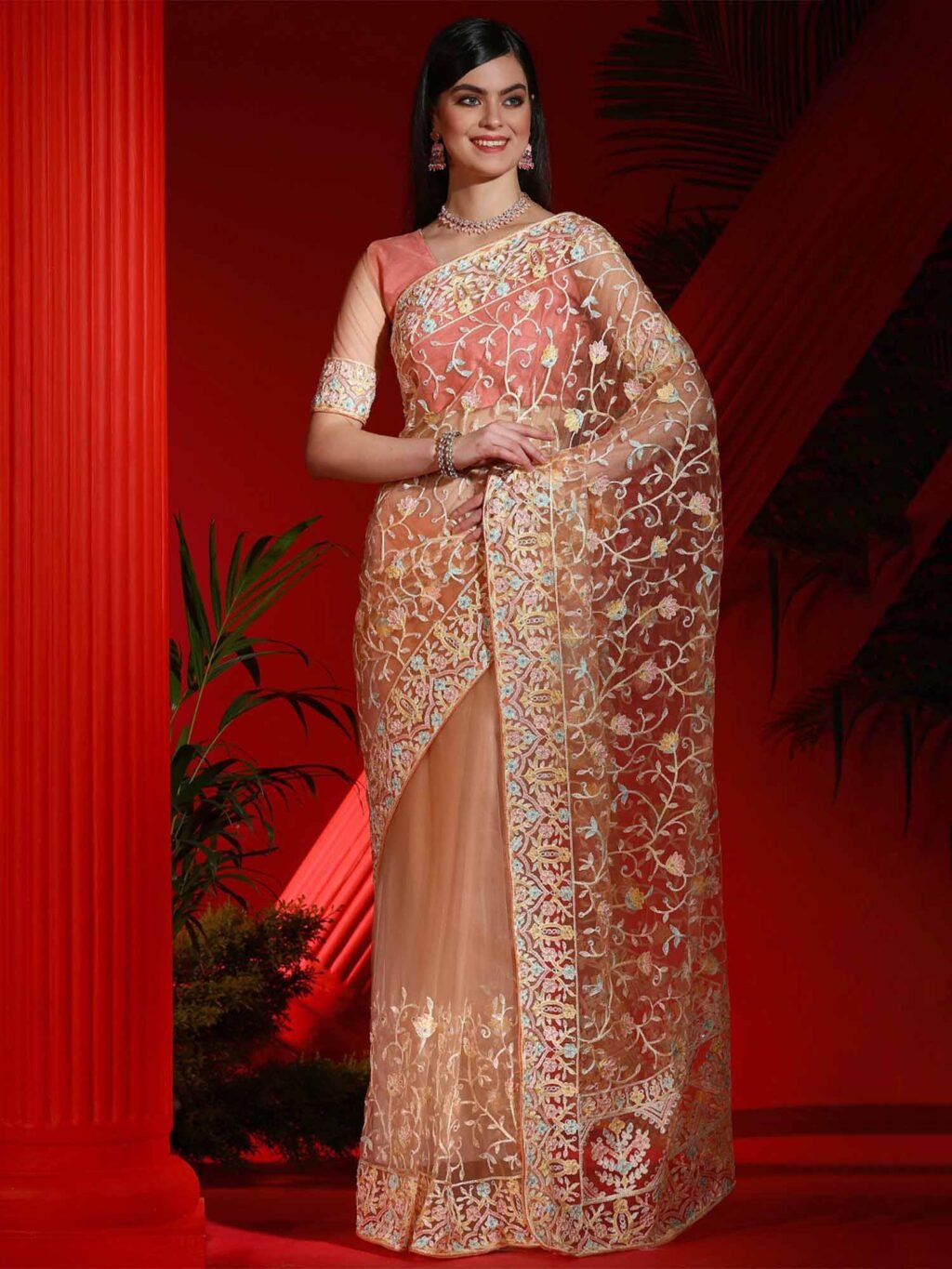 Exquisite Peach Designer Zari Woven Variant Saree - Net Saree