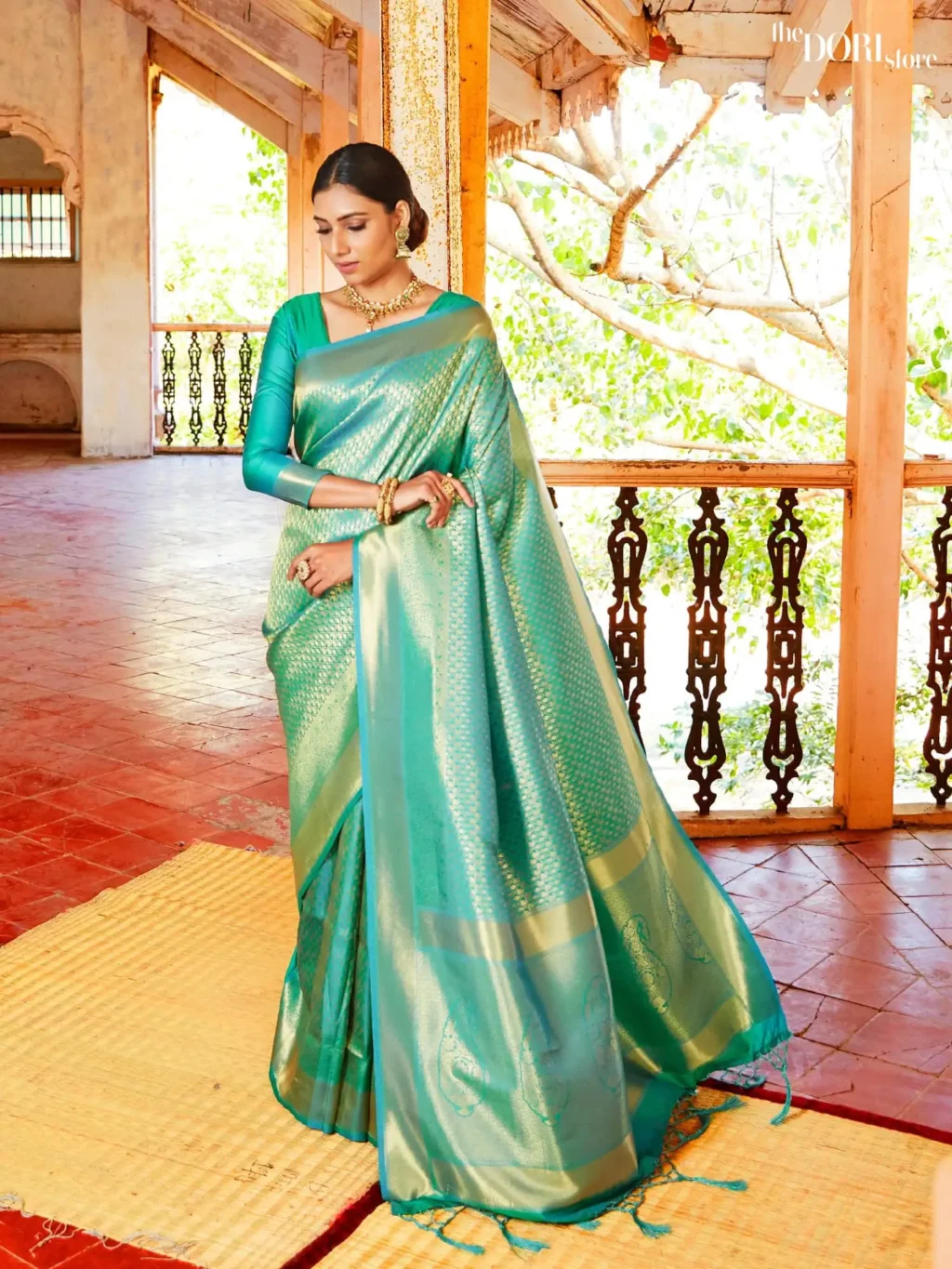 Sea Green Kanjeevaram Silk Saree with Golden Zari Border  - party wear saree