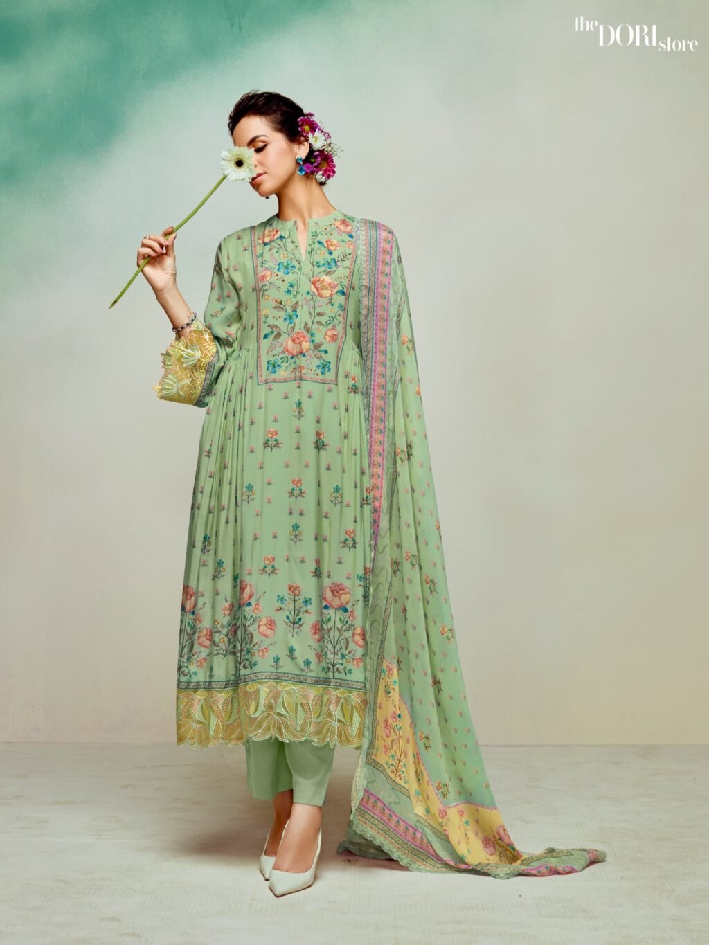 Buy Pista Green Digital Printed Muslin Suit with Organza Border  with stunning designs for women. Best ethnic wear