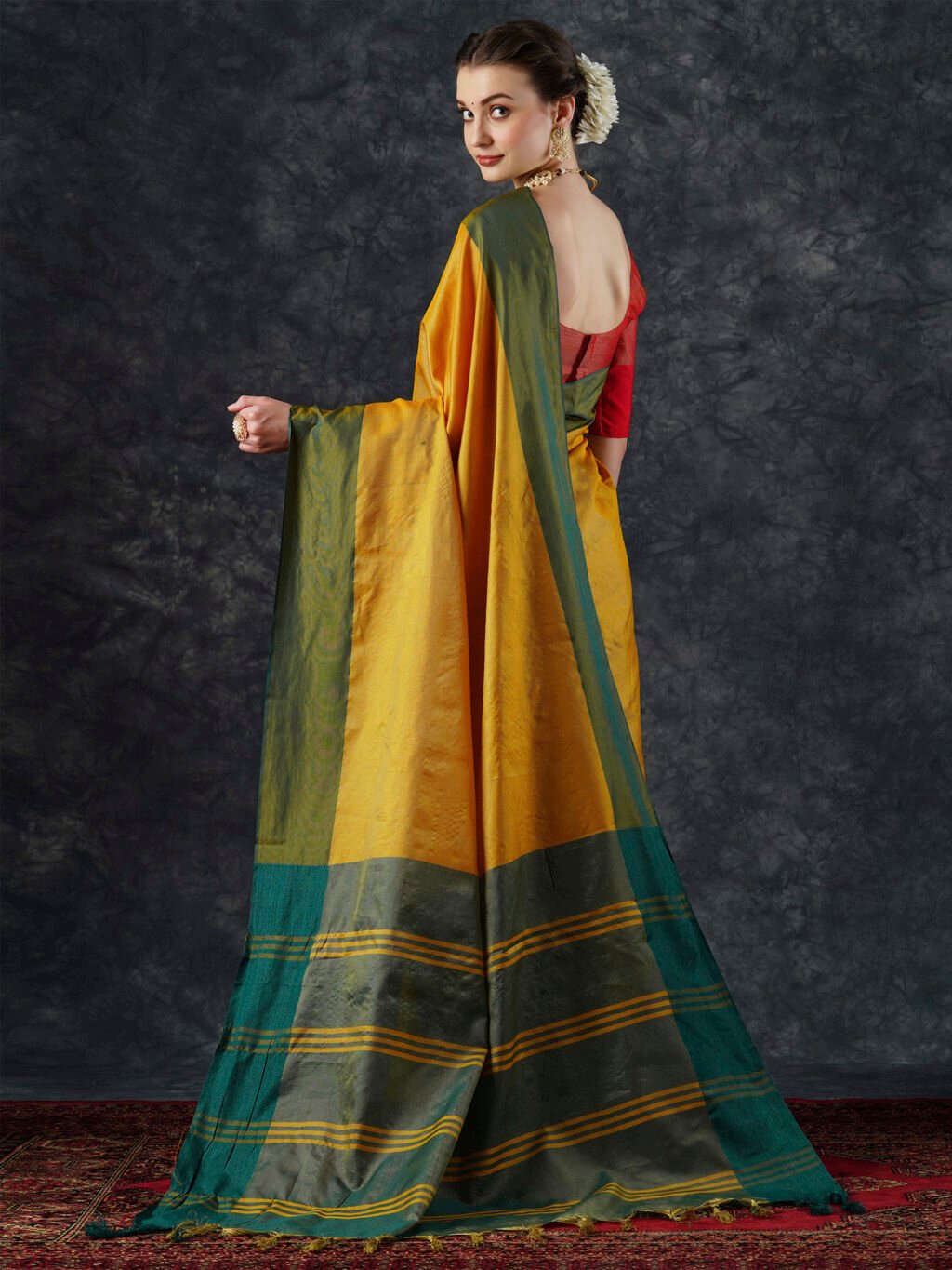 showcasing the beauty and craftsmanship of Designer Saree.