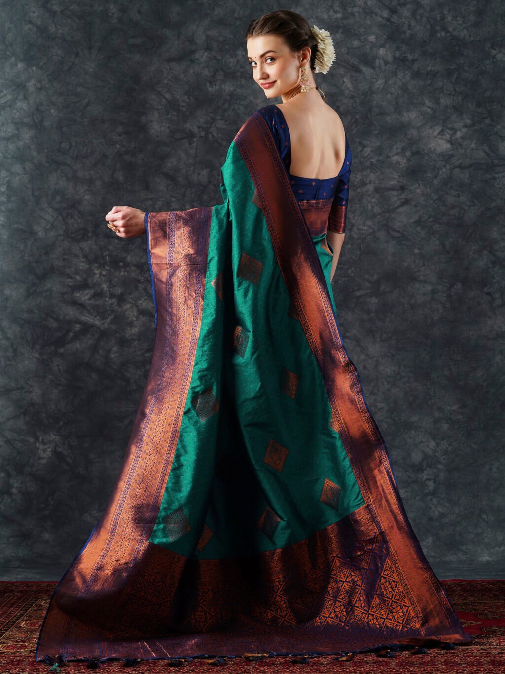 showcasing the beauty and craftsmanship of Designer Saree.