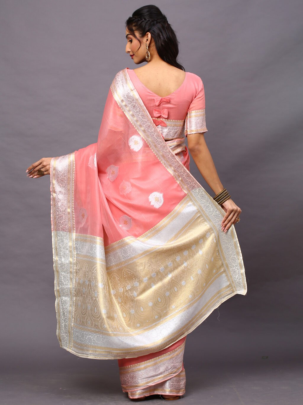 showcasing the beauty and craftsmanship of Festive Saree.