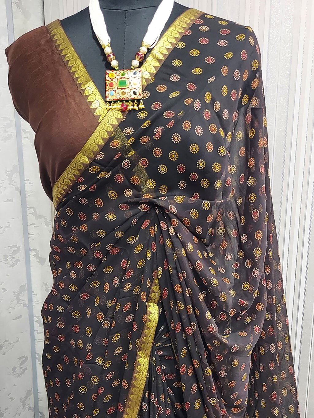 showcasing the beauty and craftsmanship of Designer Saree.