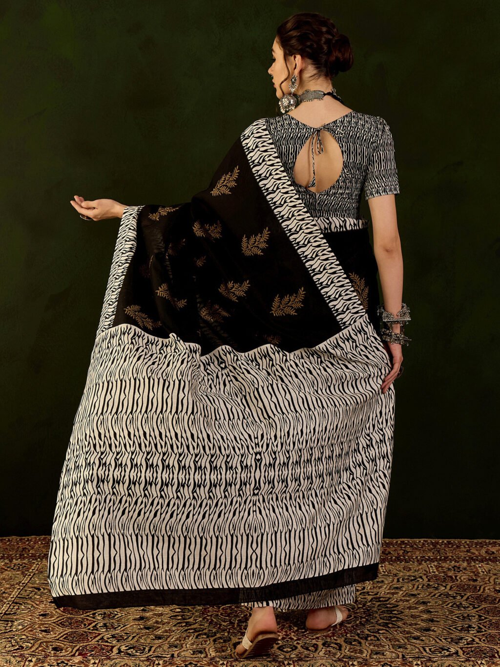 showcasing the beauty and craftsmanship of Silk Saree.