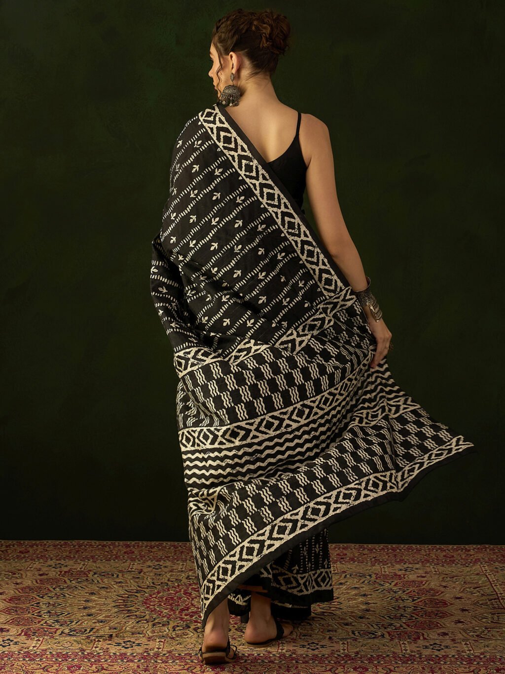 showcasing the beauty and craftsmanship of Silk Saree.