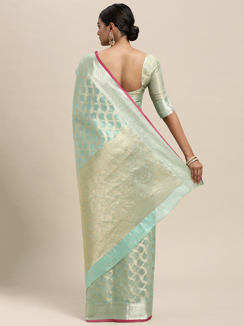 showcasing the beauty and craftsmanship of Designer Saree.