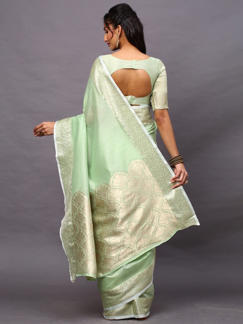 showcasing the beauty and craftsmanship of Silk Saree.