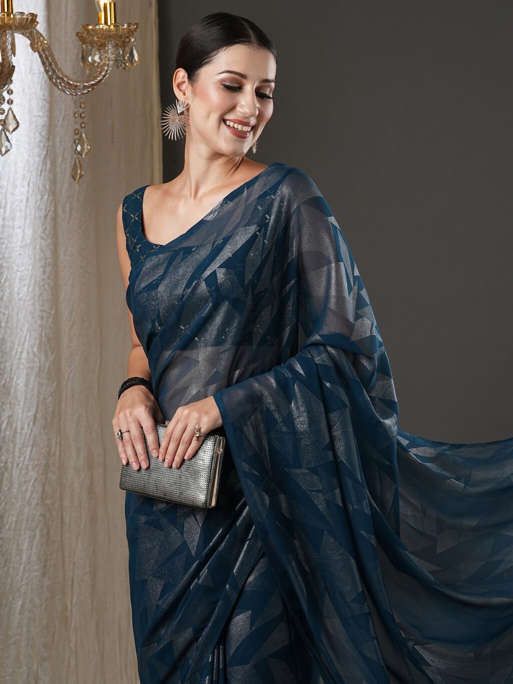 Image of Teal Blue Georgette Saree