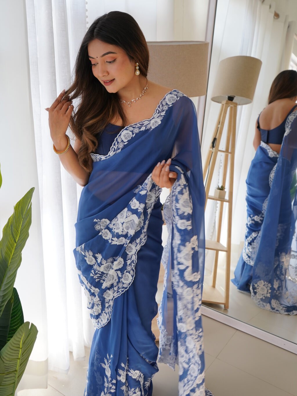showcasing the beauty and craftsmanship of Party Wear Saree.