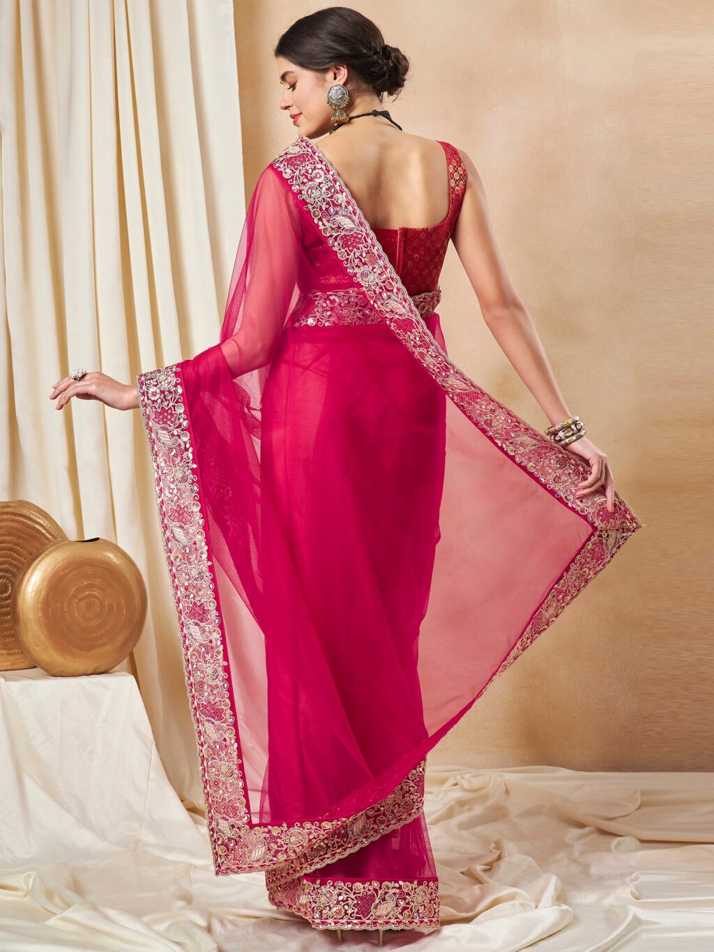 showcasing the beauty and craftsmanship of Traditional Saree.