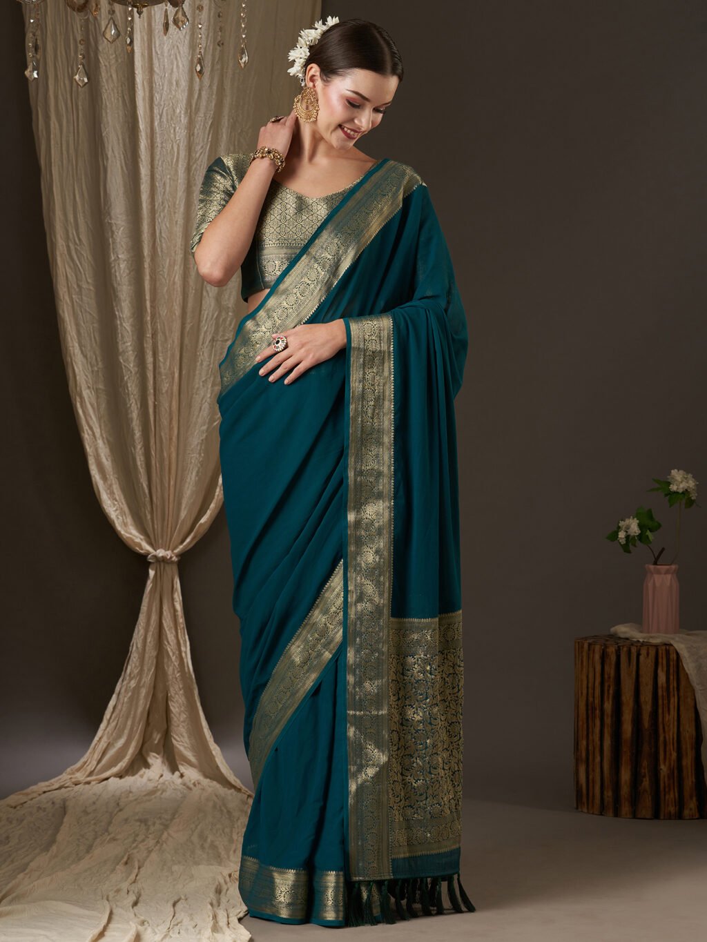 Image of Teal Blue Georgette Saree