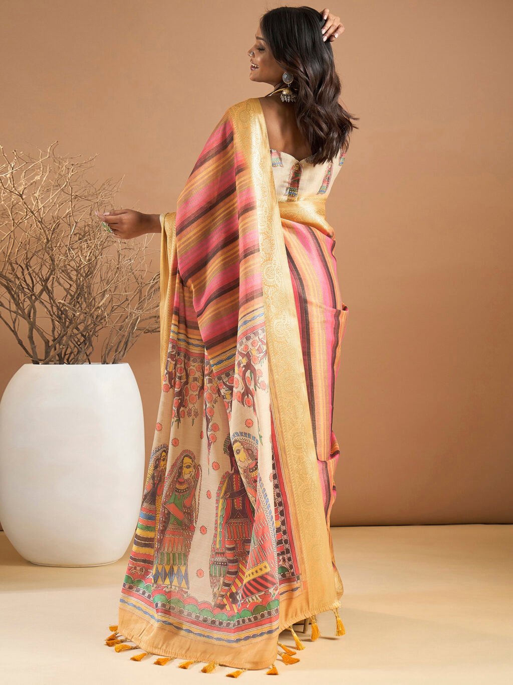 showcasing the beauty and craftsmanship of Silk Saree.