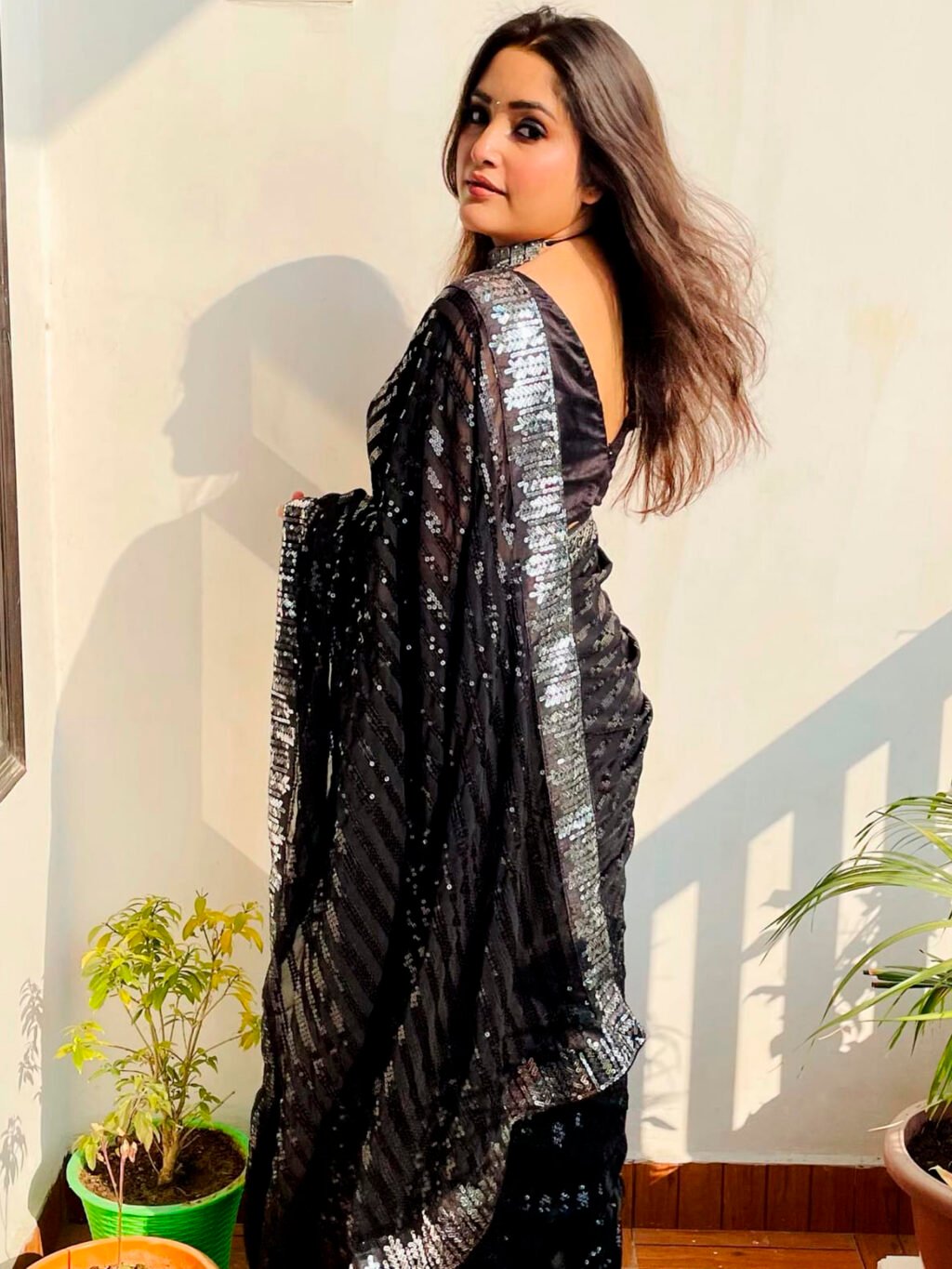 showcasing the beauty and craftsmanship of Party Wear Saree.