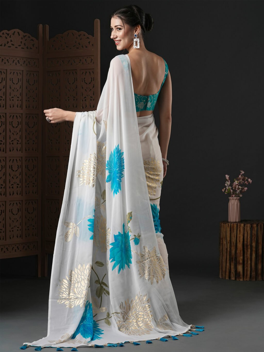 showcasing the beauty and craftsmanship of Designer Saree.