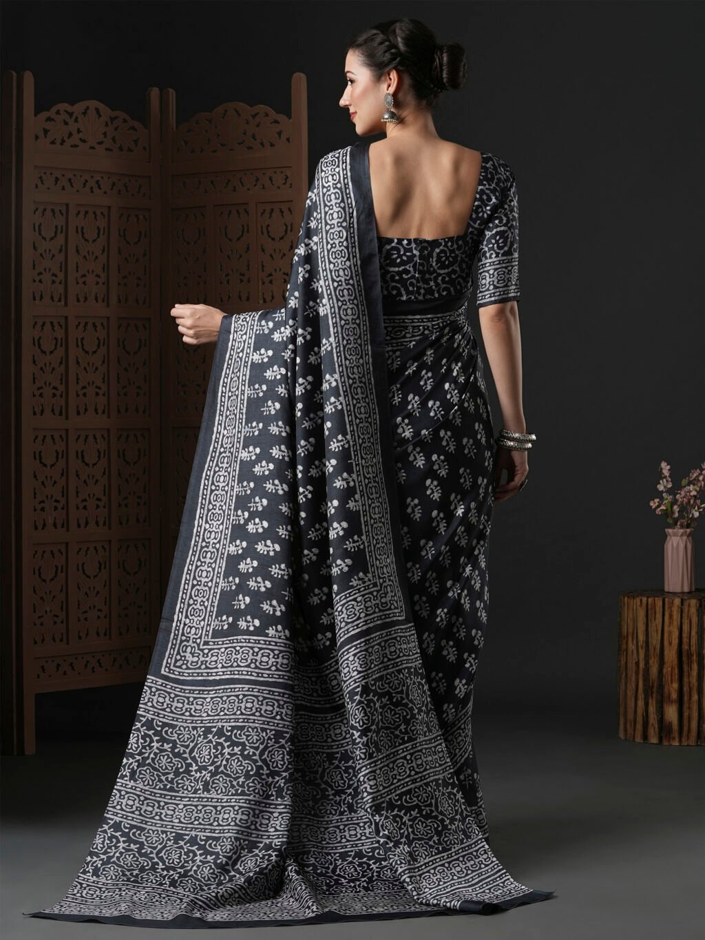 showcasing the beauty and craftsmanship of Party Wear Saree.