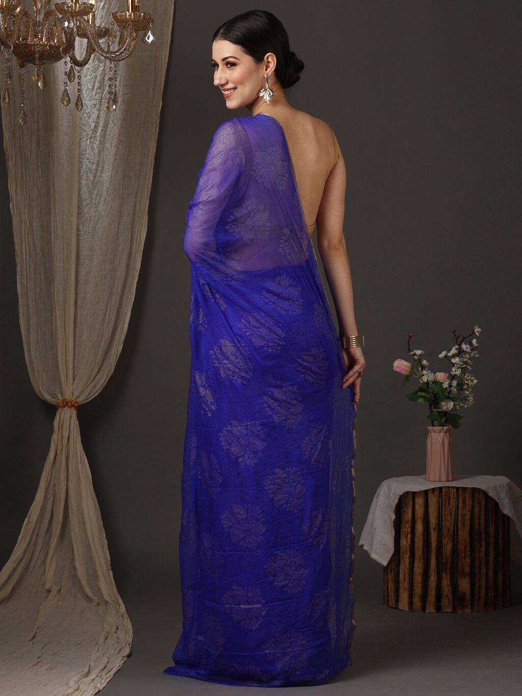 showcasing the beauty and craftsmanship of Designer Saree.