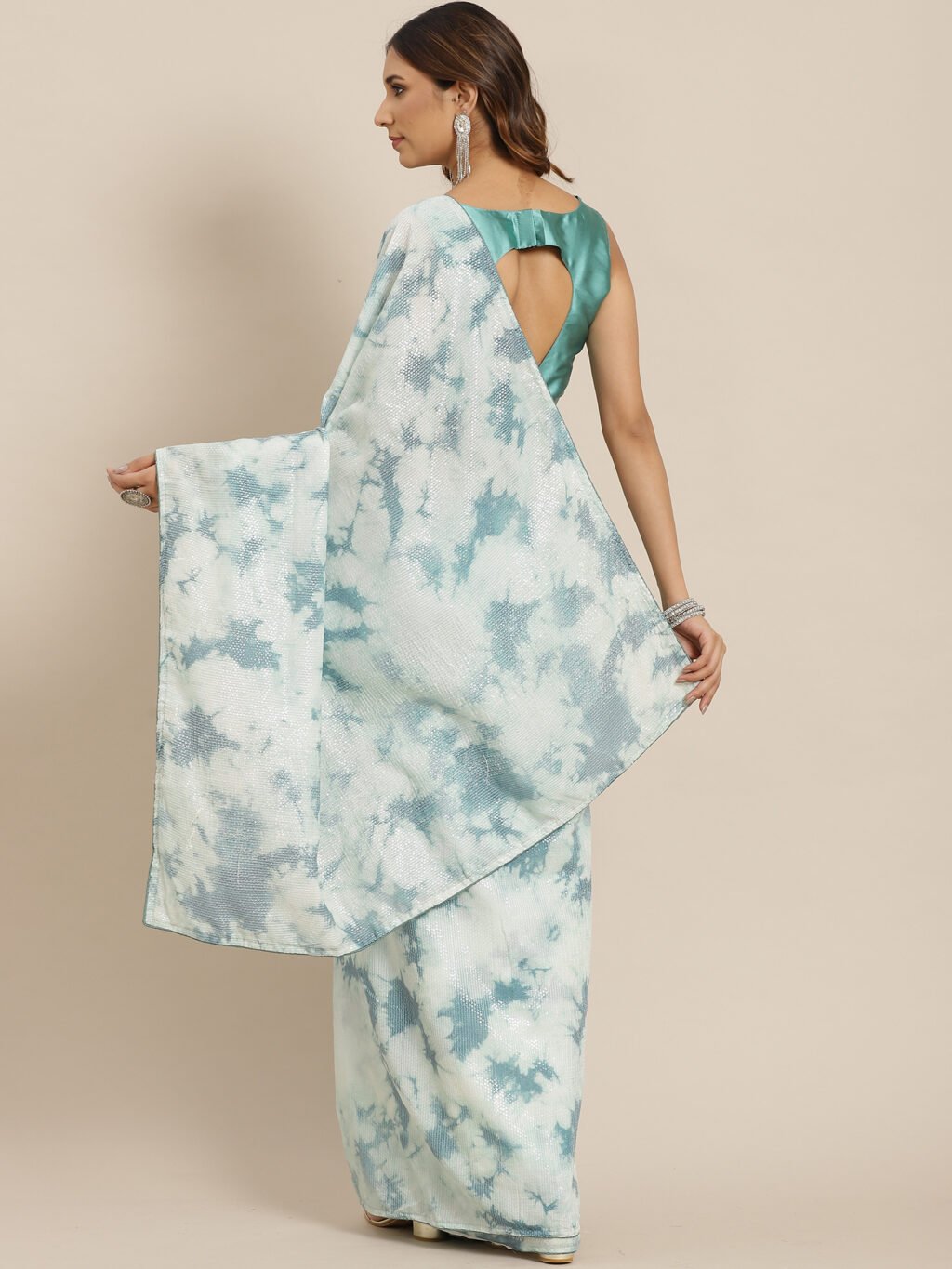 showcasing the beauty and craftsmanship of Designer Saree.