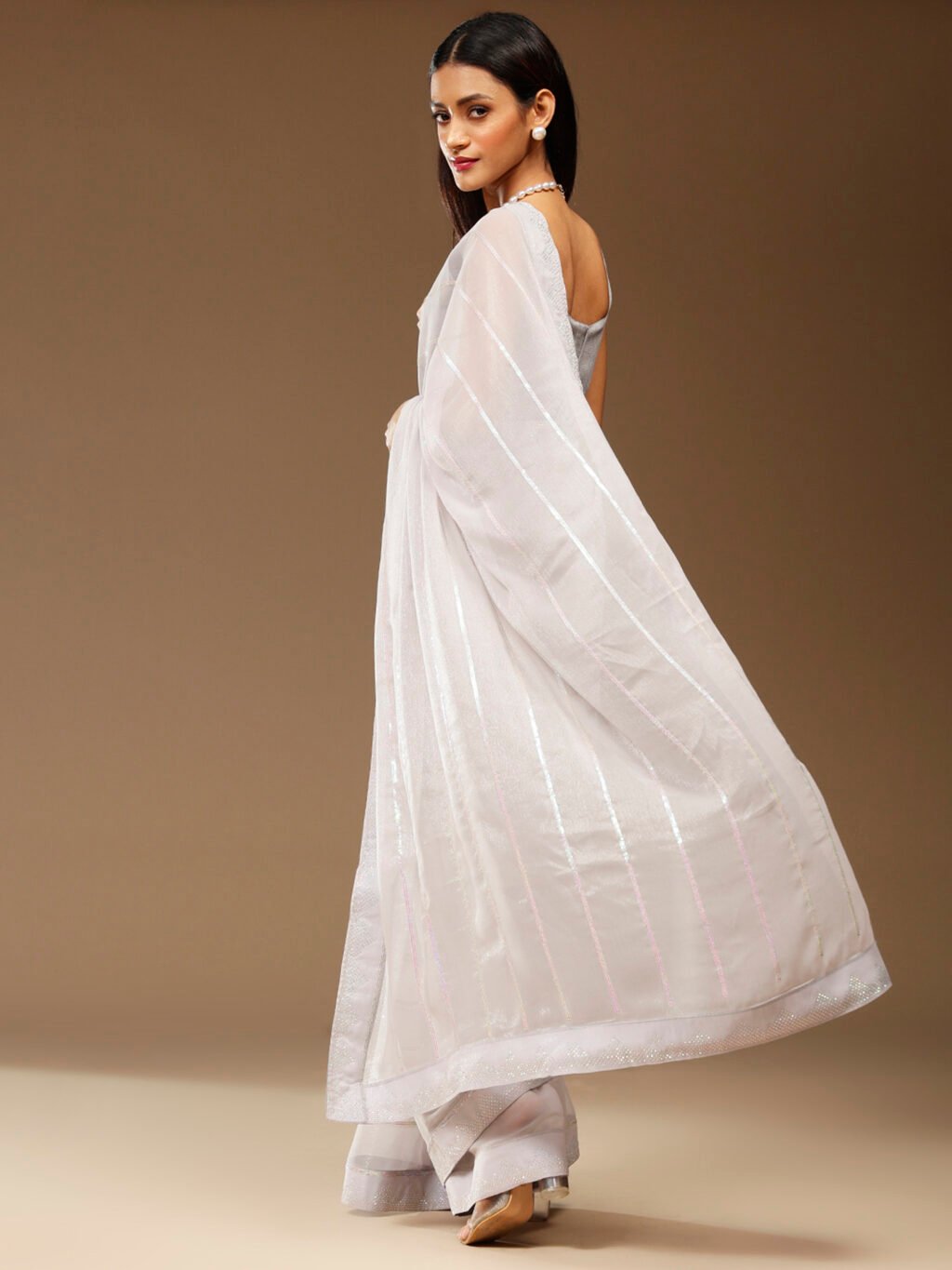showcasing the beauty and craftsmanship of Silk Saree.
