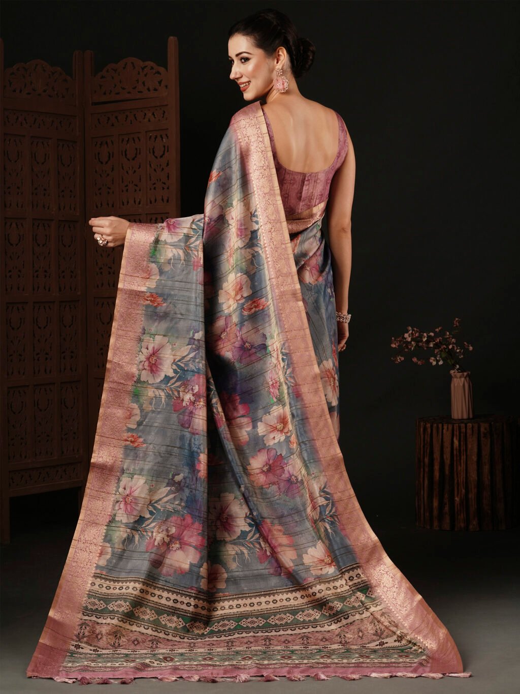 showcasing the beauty and craftsmanship of Designer Saree.