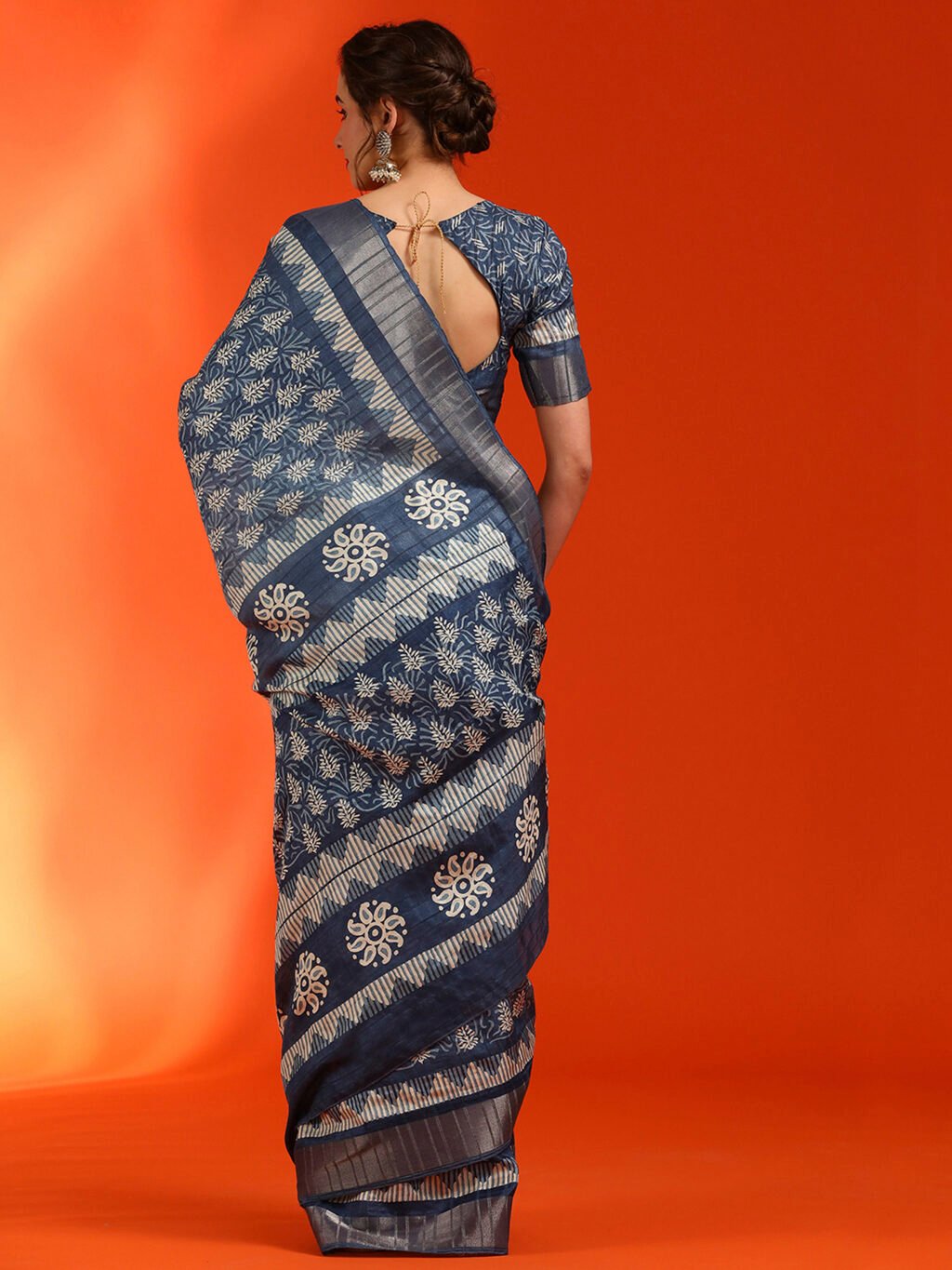 showcasing the beauty and craftsmanship of Party Wear Saree.