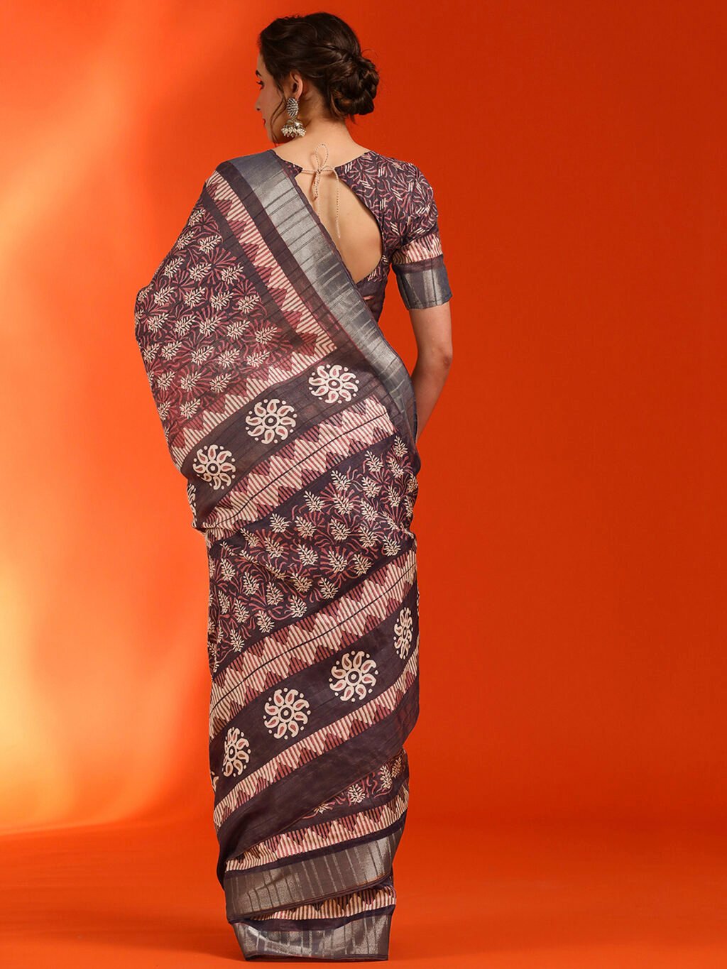 showcasing the beauty and craftsmanship of Silk Saree.