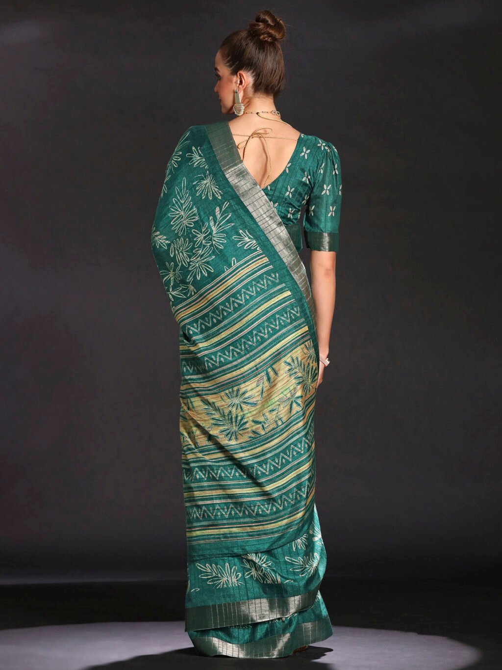 showcasing the beauty and craftsmanship of Designer Saree.