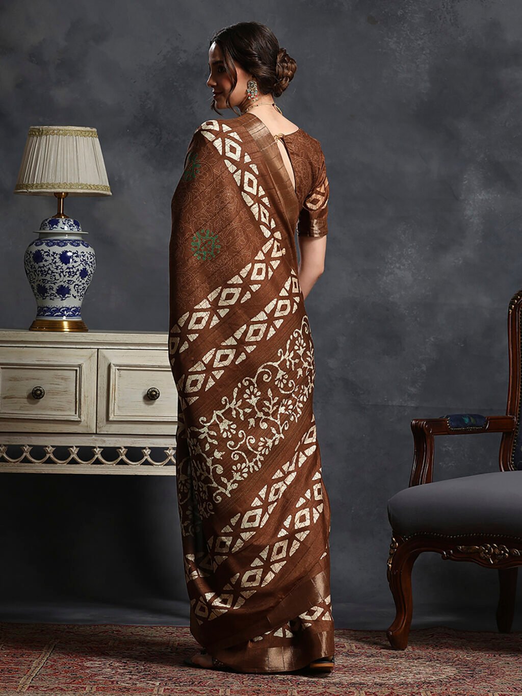 showcasing the beauty and craftsmanship of Designer Saree.