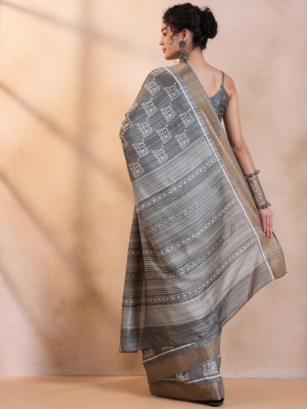 showcasing the beauty and craftsmanship of Silk Saree.