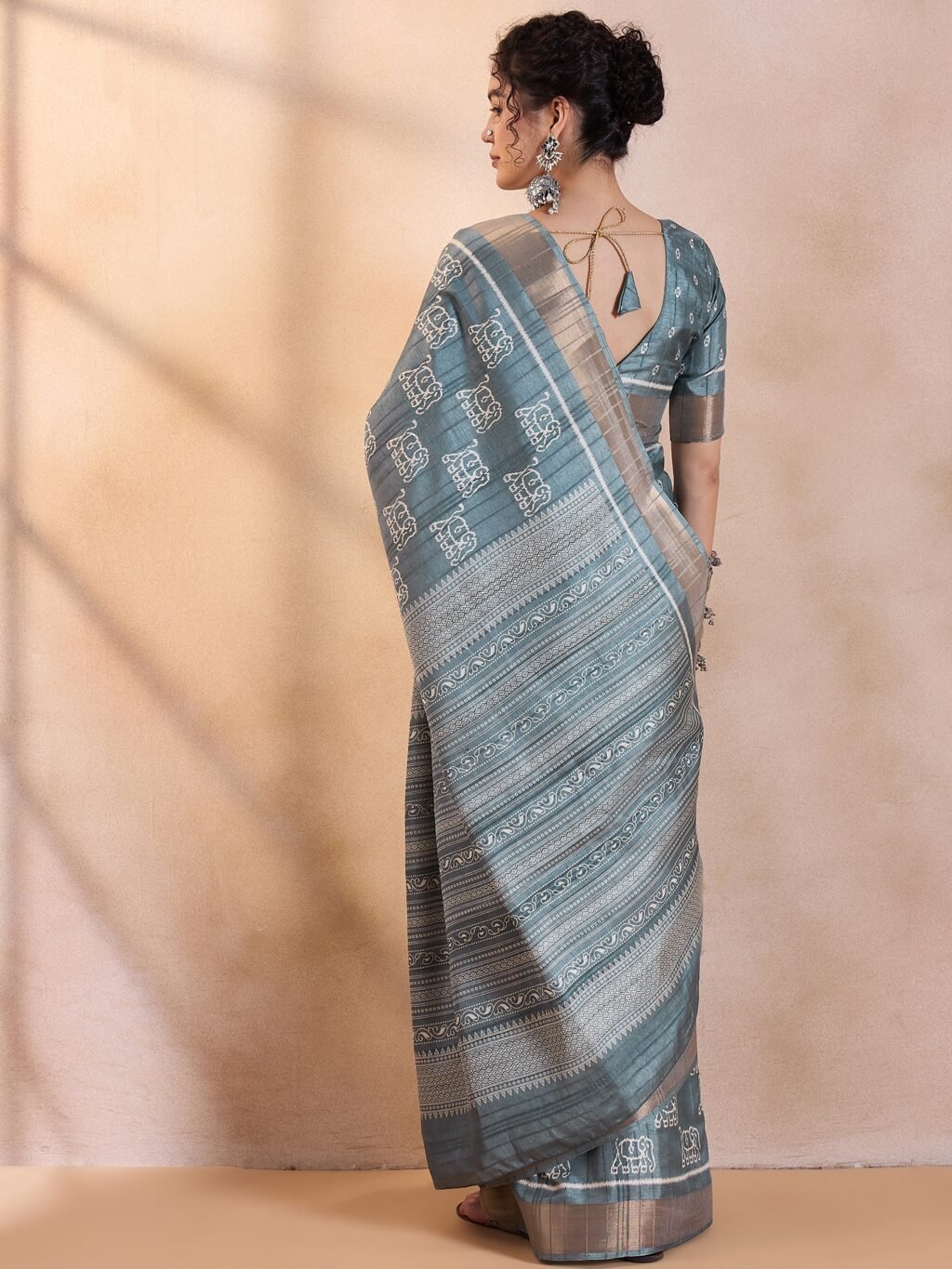 showcasing the beauty and craftsmanship of Silk Saree.