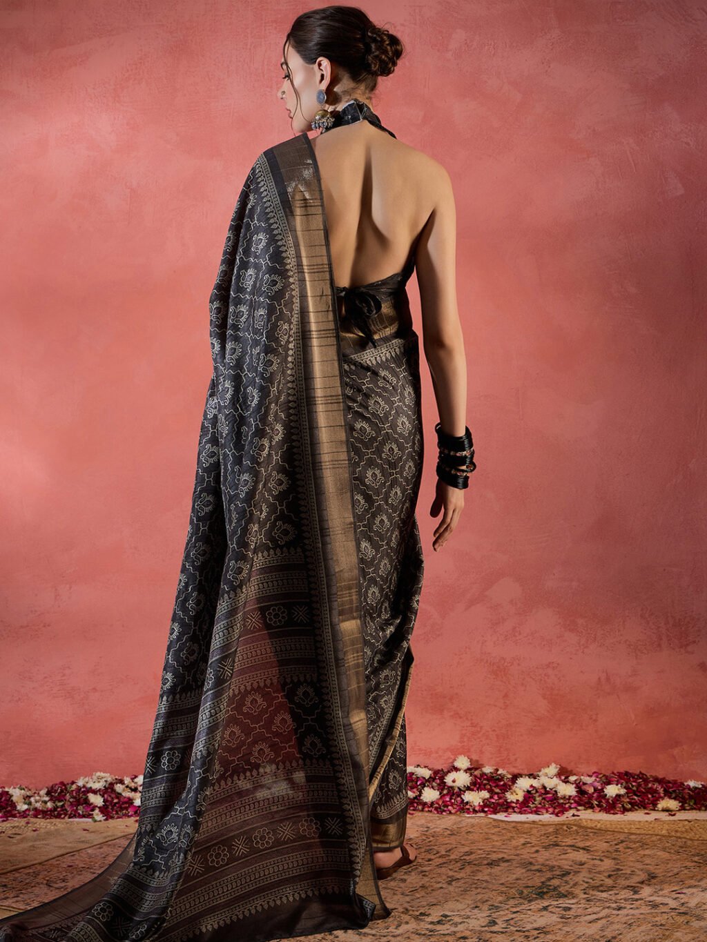 showcasing the beauty and craftsmanship of Designer Saree.
